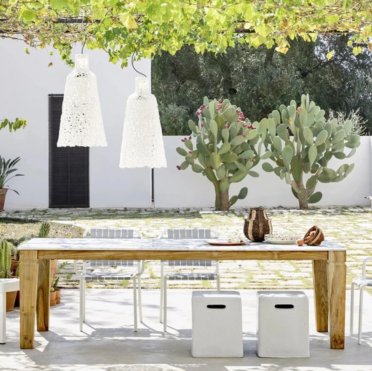 Jeko table in marble and reclaimed teak by Gervasoni.