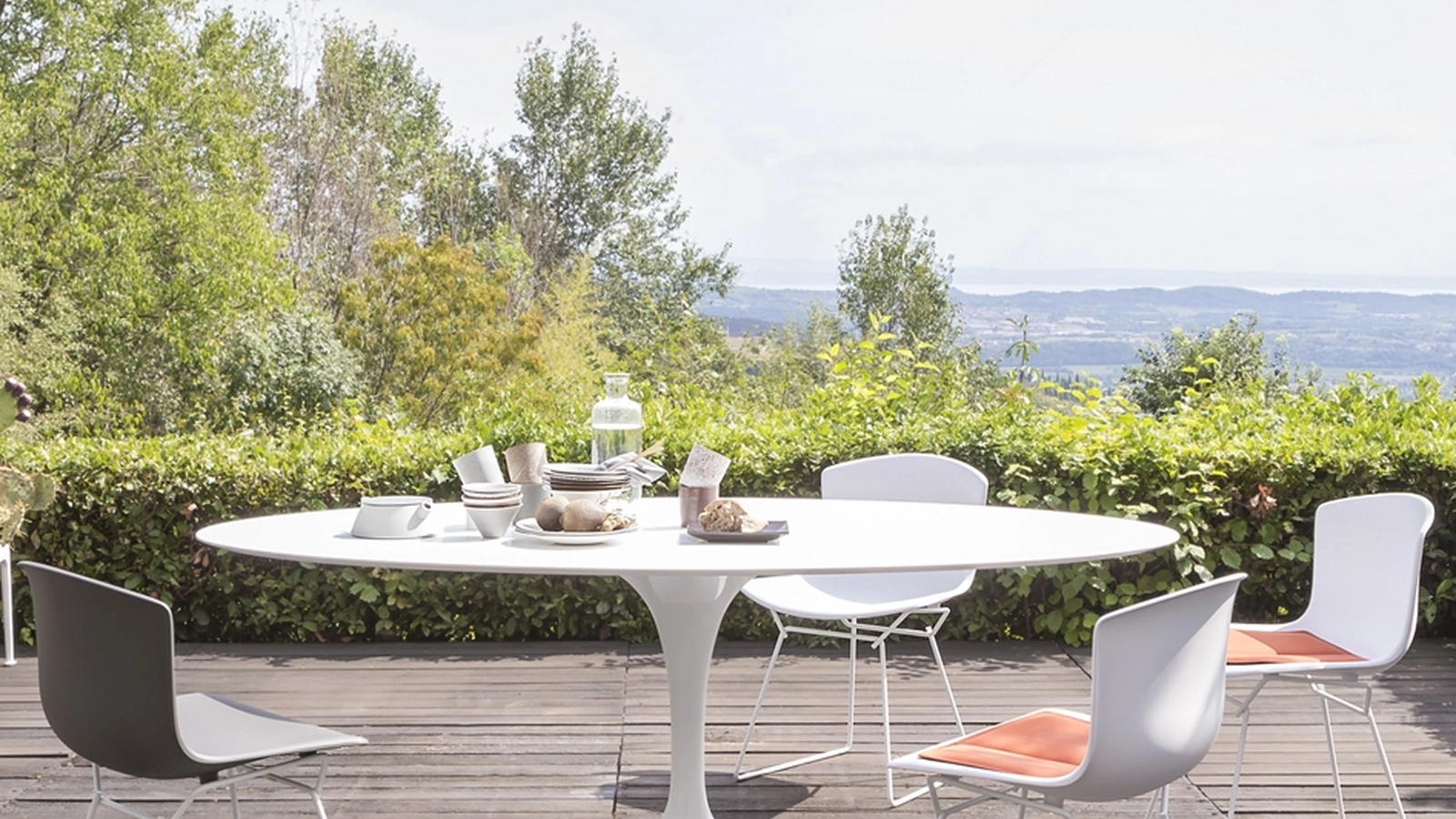 Saarinen Outdoor Dining Table by Knoll, made from synthetic stone