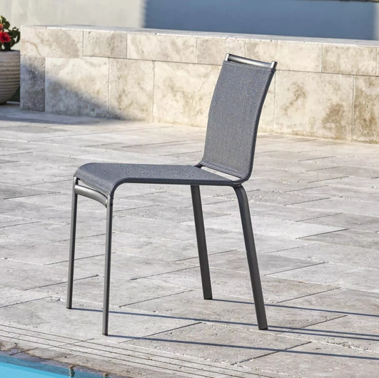 Stackable Net Outdoor garden chair with Texplast upholstery and lacquered steel structure by Bontempi.