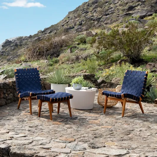 Risom Outdoor Lounge Chair armchair in fabric and Knoll wood.