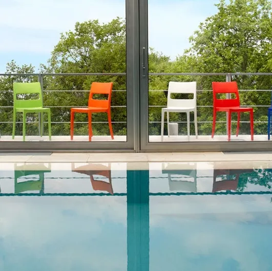 Garden chair in reinforced technopolymer with fiberglass available in various colors by Scab Design.