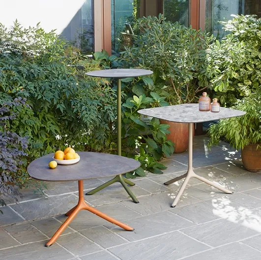 Tripod coffee tables by Scab Design.