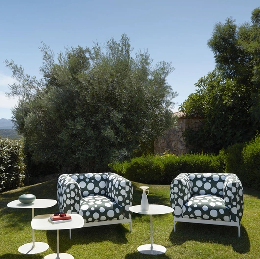Thierry glass and metal tables by Kartell.