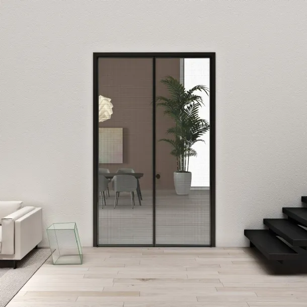 Aladin Double Swing Plain Mono interior door in glass with aluminum frame by Glas Italia.