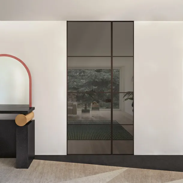 Sherazade Double Swing Plain Plus interior door in glass and aluminum by Glas Italia.
