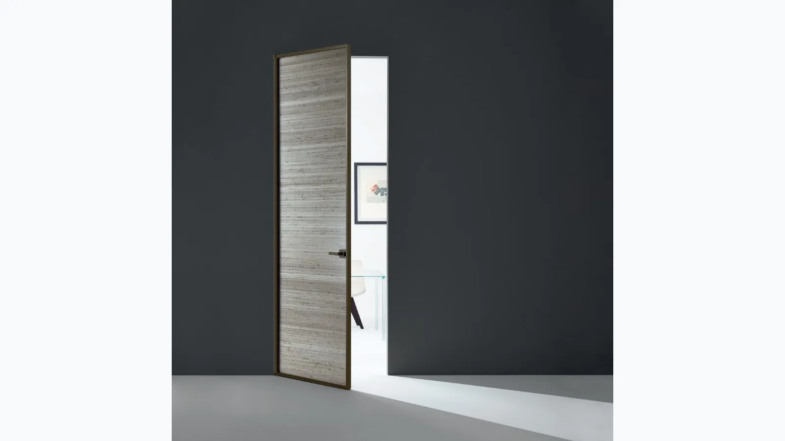 Sherazade Swing Plain interior door in glass with aluminum frame by Glas Italia.